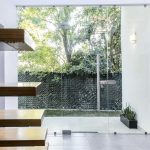 Casa en el Bosque / Racma Arquitectura