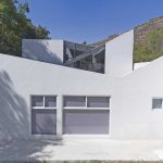 Casa en el Bosque / Racma Arquitectura